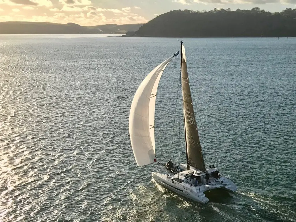 Dazcat 1295 with spinnaker up dazcat performance family cruiser racer carbon 1295 strong safe powerful multimarine RORC MOCRA