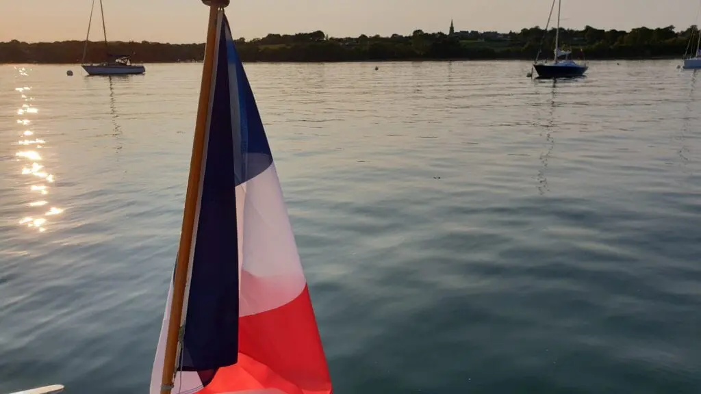 French flag on Dazcat's structurally complete hull boat merlin
