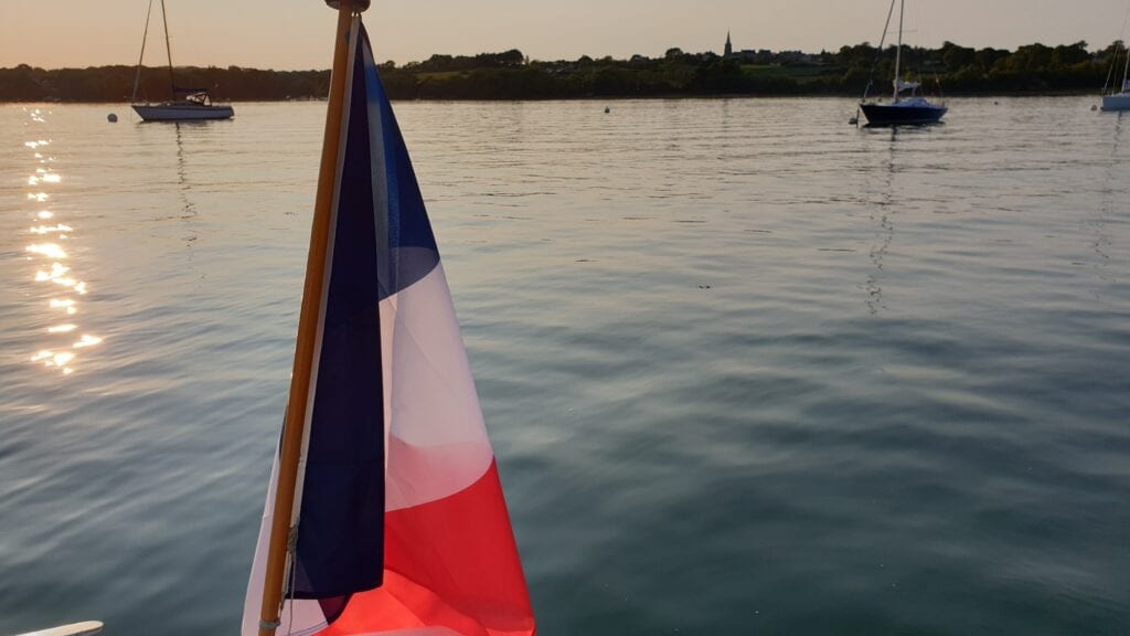 French flag on Dazcat's structurally complete hull boat merlin