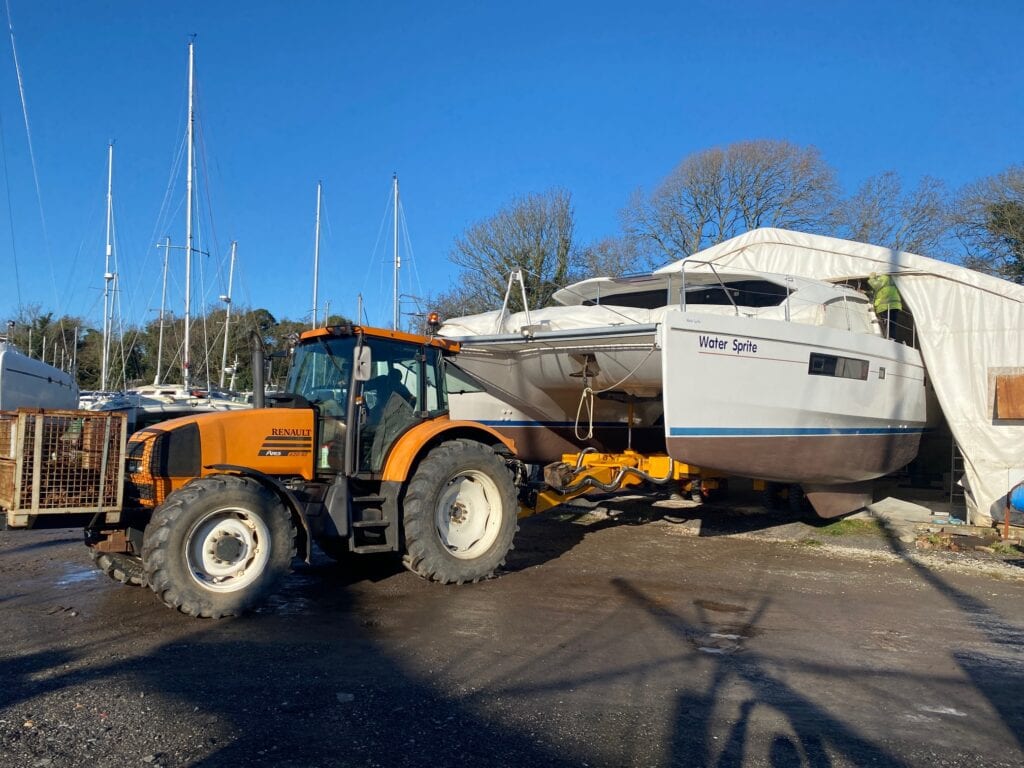 emerging from multihull centre yard shed with new copper coat bottom